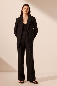 Oversized tailored blazer with double button closure. Oversized Chic Blazer At Affordable Price, Oversized Chic Blazer At A Cheap Price, Oversized Cheap Blazer For Workwear, Cheap Oversized Blazer For Workwear, Luxury Oversized Blazer For Semi-formal Occasions, Affordable Oversized Solid Color Blazer, Affordable Tailored Black Blazer, Cheap Chic Oversized Blazer, Cheap Tailored Black Blazer