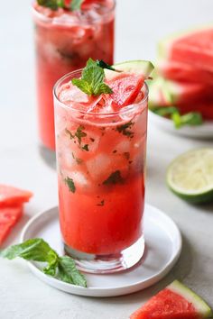 watermelon mojitas with mint garnish and lime on the side