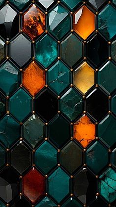 a close up view of some colorful glass tiles