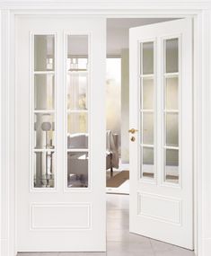 an open white door leading to a bathroom