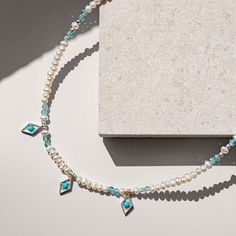 Give the gift of love with the Mughal Love Necklace. Delicate real gemstones of Pearl and Apatite cleverly combine with 3 delicate Moorish inspired silver charms, a Turquoise stone in the centre of each, creating this elegant adjustable necklace. Mexican and Moroccan influences in the charms hint at Charlotte's foreign travels.  Handmade Sterling silver, Pearl & faceted Apatite All of our stones are real so colours may vary Handmade jewellery made from sterling silver, brass, bronze, and mixed m Elegant Apatite Necklace As Gift, Elegant Apatite Necklace For Gifts, Elegant Apatite Jewelry With Birthstone, Elegant Apatite Birthstone Jewelry, Silver Beaded Necklace, Charlotte's Web, August Birthstone Jewelry, July Birthstone Jewelry, Silver Bead Necklace