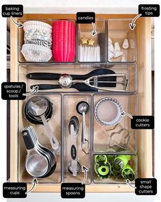 an organized kitchen drawer with utensils and other items labeled in black text on it