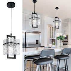 the chandelier in this kitchen is made out of glass and has four lights