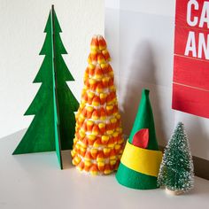 some candy corn trees are sitting on a table