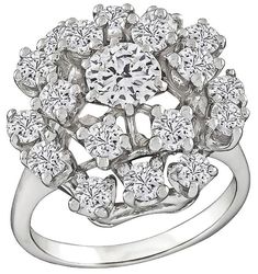 This beautiful 14k white gold ring is set with sparkling round cut diamonds that weigh approximately 2.20ct. graded G color with VS clarity. The top of the ring measures 18mm in diameter. It is currently size 8 1/4, and can easily be resized. Inventory #12593PWSS Diamond Crown, Diamond Cocktail Ring, Gold Cocktail Ring, Gold Cocktail, Diamond Cocktail Rings, Diamond Charm, 14k White Gold Ring, Diamond Cluster Ring, White Gold Ring