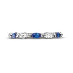 a diamond and blue sapphire band