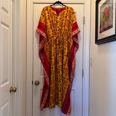 Spectacular 100% Silk Kaftan Earth Bound Trading Company 21.5” Max Pit To Pit 52.5” Shoulder To Hem 40” Cuff To Cuff And Hem Width On One Side 34” Side Split There Is Some Pull At Side Seam See Photos Some Imperfections In Print On Back. See Photos Bohemian Orange Printed Kimono, Traditional Orange Tunic Kaftan, Traditional Orange Maxi Kaftan, Red Oversized Bohemian Kaftan, Orange Printed Maxi Kaftan, Printed Orange Maxi-length Kaftan, Printed Orange Maxi Length Kaftan, Traditional Batik Print Kaftan For Vacation, Orange Bohemian Batik Print Dress