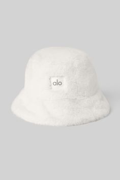 Lightweight. Super-soft. Street-ready. The Faux Fur Bucket Hat is the perfect choice for warming winter headwear in an on-trend bucket hat silhouette. Male Wardrobe, Hat Silhouette, Ivory Hat, Fuzzy Bucket Hat, Winter Headwear, White Bucket Hat, Gym Bag Essentials, Fur Bucket, Faux Fur Bucket Hat