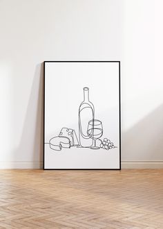 a black and white drawing of a wine bottle with bread on the table next to it