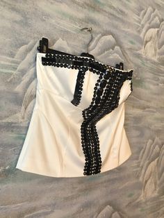 "White Embroidered Corset Top Boned Bodice Strapless Top Sweetheart Bust Steampunk Size Medium Estimated size: M Material: 97%Polyester; 3%Elastane Linning: 100%Polyester Measurements: (lying flat) Lengt: 15\" / 38 cm Pit to pit: 16\" / 40.5 cm Waist: 15\" / 38 cm Please check measurements to insure a proper fit. Remember to allow yourself some extra room for movement. You can compare these with something from your closet that fits you well. This tops will come to you freshly laundered and ready Fitted Embellished Strapless Tube Top, Embellished Fitted Strapless Tube Top, Summer Embellished Corset For Night Out, White Strapless Club Top, White Strapless Top For Club, Edgy Corset For Summer Parties, Embellished Summer Corset, Edgy Bandeau Tube Top For Party, Edgy Party Corset For Summer