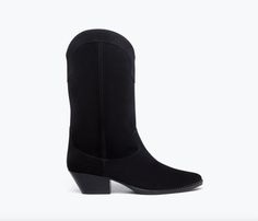 The city-dweller cowboy boot. handcrafted in their signature black suede the loretta nods to a classic western style with the pointed toe angled heel and leather notched welt. the ease of its pull-on entry makes it an effortless option for roaming city streets in everyday dresses or cutoffs.    100% italian leather in black suede 100% italian calf leather lining    padded leather footbed    1.5" matte black leather stacked heel with rubber heel cap and spay for enhanced durability    notched lea Freda Salvador, Heel Caps, A Perfect Circle, Rubber Heels, Everyday Dresses, Stacked Heel, Western Boots, Black Suede, Italian Leather