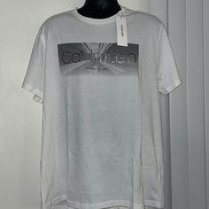 Color: White Size:M , X-L Calvin Klein White Logo Print T-shirt, White Calvin Klein Crew Neck T-shirt, Calvin Klein White Crew Neck T-shirt, White Short Sleeve Calvin Klein Shirt, Calvin Klein White Short Sleeve Top, Calvin Klein White Short Sleeve Shirt, White Calvin Klein Casual Shirt, Calvin Klein White Relaxed Fit T-shirt, Casual White Calvin Klein Shirt