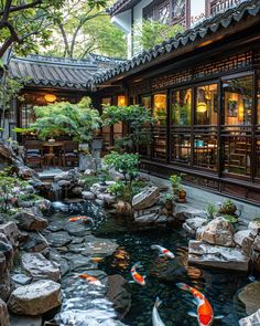 a japanese garden with koi fish swimming in the water