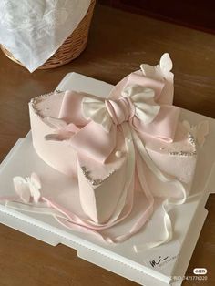 there is a cake that has been made to look like a princess's bow