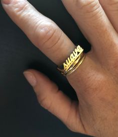 "Have a little fun and take your bling to another level with the Suave word ring. Stack it with other smaller rings. Pair it with other word rings like this one: https://www.etsy.com/listing/1063378702/rico-word-ring-rico-rich-word-ring?ref=shop_home_active_1&frs=1 word length: 16mm word height: 3 mm word width: 4 mm shank width: 1.5 mm This ring can be cast in brass, silver, or 14k gold plated over silver. If you are interested in solid gold please message me and we can discuss pricing. Love it Jewelry Latina, Word Rings, Nameplate Ring, Latina Jewelry, Word Ring, Spanish Words, Ring Stack, Small Rings, Ring Gold