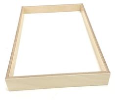 an unfinished wooden frame on a white background