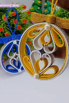 an ornament made out of paper with scissors