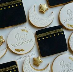 decorated cookies with gold stars and moon on them