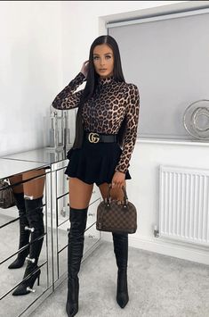 The bodysuit trend is here to stay - this leopard print bodysuit featuring high neck & long sleeves has you covered if you want to swap tops for this chic body-hugging piece. For a night out team this with coated jeggings & strappy high heels. leopard print bodysuit long sleeves high neck regular fit approx length is 68cm model is 5ft 7" & wears US Small 95% polyester 5% elastane machine washable Night Out Outfit Classy, Leopard Print Bodysuit, Chique Outfits, Glam Outfit, Body Suit Outfits, Strappy High Heels, Night Out Outfit, High Neck Long Sleeve, Print Bodysuit