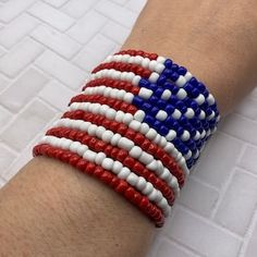 American Flag Colors Memory Wire Bracelet With Silver or Golden Charms - Etsy Patriotic White Stretch Bracelet With Round Beads, Patriotic White Stretch Bracelet, Adjustable White Patriotic Beaded Bracelets, Patriotic Round Beads Stretch Bracelet For 4th Of July, Patriotic White Stretch Bracelet As Gift, Patriotic Beaded Bracelets For 4th Of July, Patriotic White Stretch Bracelet Gift, Adjustable White Bracelet For 4th Of July, White Beaded Bracelets For 4th Of July Gift