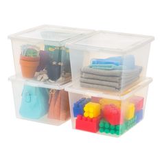 three plastic storage containers filled with toys and other items