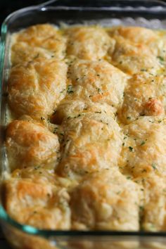 a casserole dish filled with meat and cheese