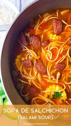 a large pot filled with soup and vegetables