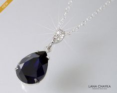 Wedding Preciosa MAXIMA Dark Indigo Dark Navy Blue Crystal Silver Teardrop Bridal Bridesmaids Necklace with .925 Sterling Silver Chain. CHAIN is 18 inches (45.7cm) long. PENDANT is 0.94 inch (2.4cm) long including bail. MATCHING EARRINGS (Pic.#8): https://www.etsy.com/listing/267971778/navy-blue-crystal-earrings-preciosa-dark?ref=shop_home_active_2 BRIDESMAIDS JEWELRY SECTION: https://www.etsy.com/shop/LanaChayka?ref=simple-shop-header-name&listing_id=685998344§ion_id=11843115 Handmade neckl Sapphire Drop Necklace For Wedding, Elegant Blue Crystal Necklace, Midnight Blue Necklace, Blue Crystal Pendant Necklaces, Sapphire Crystal Pendant Necklace, Elegant Blue Crystal Pendant Necklace, Teardrop Silver Earrings, Navy Blue Jewelry, Prom Necklaces