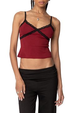 Give laid-back vibes in this stretch-cotton cami that has floral-lace trim. V-neck Adjustable straps 95% cotton, 5% spandex Machine wash, dry flat Imported Trendy Stretch Camisole With Lace Trim, Stretch Cotton Camisole With Delicate Straps, Fitted Cotton Tank Top With Delicate Straps, Trendy Fitted Tank Top With Lace Trim, Stretch Cotton Tops With Delicate Straps, Cotton Stretch Tops With Delicate Straps, Cotton Stretch Camisole With Bra-friendly Design, Stretch Cotton Camisole With Bra-friendly Design, Cotton Cami Tank Top With Straps