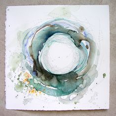 an abstract painting with watercolors on paper