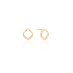 Crafted with 18K Gold plated or Rhodium, these little organic zirconia earrings offer a sophisticated touch to any outfit. The sparkling zirconias add a touch of elegance, while the high-quality materials ensure durability and lasting shine. Perfect for adding a subtle, yet eye-catching element to your look. Modern Tarnish Resistant Diamond Earrings, Modern Tarnish-resistant Diamond Earrings, Modern Earrings With Pave Setting, Tarnish Resistant Diamond White Cubic Zirconia Earrings, Modern Gold Earrings With Sparkling Stones, Modern Pave Set Earrings For Gift, Modern Pave Set Earrings As Gift, Elegant Gold-plated Tarnish-resistant Diamond Earrings, Sparkling Stones Yellow Gold-plated Earrings