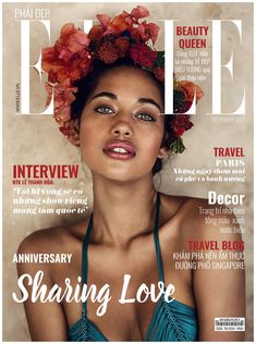 a woman with flowers in her hair is featured on the cover of an issue of magazine