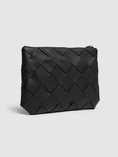 Height: 16.5cm Width: 25cm Depth: 2cm. Wristlet,Drop: 23 cm. Top zip closure. Single compartment. Lined,Interior leather tag with embossed logo Bottega Veneta Pouch, Bottega Veneta Jodie, New Bottega, Bottega Veneta Bags, Latest Bags, Large Pouch, Leather Tag, Leather Pouch, Black Cross Body Bag