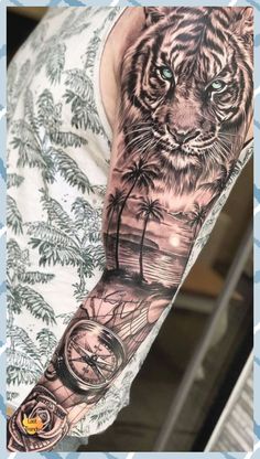 a man's arm with a tiger and palm tree tattoo on the left sleeve