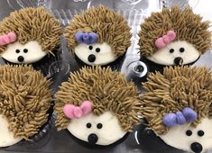 cupcakes decorated like hedgehogs with pink bows