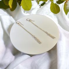 The Emma- 💙14k Gold Filled Ball Hook 💙14k Dainty Cable Chain 💙3inch Drop 💙6 Tiny, Dainty Freshwater Pearls Why choose Gold Filled?  Gold filled jewelry contains about 100 times the amount of gold than a gold plated item. The gold is fused to the base metal using pressure and high heat so it will never flake or peel. Gold filled products will not tarnish under normal circumstances. If necessary, you can clean the necklace gently with a soft cloth. Keep harsh chemicals away such as sunscreens, lotions, perfumes, soaps etc. Hypoallergenic Yellow Gold Dangle Jewelry, Classic Hypoallergenic Sterling Silver Jewelry, Hypoallergenic Classic Sterling Silver Jewelry, Hypoallergenic 14k White Gold Filled Jewelry, Hypoallergenic Dangle Jewelry For Anniversary, Nickel-free Yellow Gold Jewelry For Anniversary, Fine Jewelry Sterling Silver Pearl Dangle Earrings, Sterling Silver Jewelry With Ear Wire In Gold, Classic Hypoallergenic Sterling Silver Linear Earrings