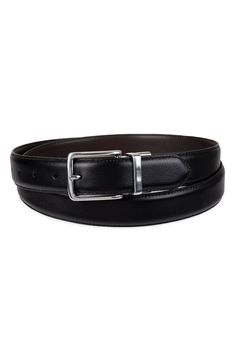 Polished hardware fastens this smooth leather belt that reverses from black to brown to double your wearing options. 1 1/4" belt width Leather/polyurethane Imported Modern Brown Belts For Office Wear, Black Self Belt For Office, Black Self Belt For Business, Leather Belt Buckles With Belt For Office, Classic Black Belt For Work, Classic Black Belt For Workwear, Classic Black Belt For Business Casual, Elegant Black Leather Belts And Suspenders, Black Leather Belt For Business Casual