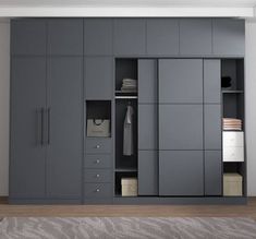 a room with some gray cabinets and drawers