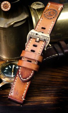 Watch band, strap, cuff. 24mm. Handmade leatherwork  since 1991. Topouzelli Vintage Brown Leather Watch Band, Rugged Brown Waxed Watch Band, Rugged Brown Waxed Finish Watch Bands, Rugged Belt Buckles With Leather Strap For Everyday Use, Rugged Brown Belt Buckles With Leather Strap, Vintage Brown Leather Strap Watch Band, Vintage Leather Watch Accessories In Distressed Brown, Vintage Distressed Brown Leather Watch Accessories, Vintage Brown Watch Bands With Waxed Finish