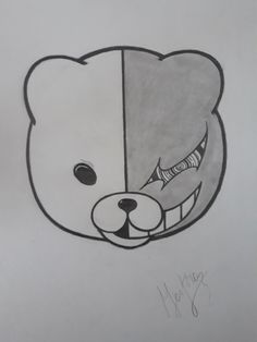 a drawing of a teddy bear's face with the word happy on it