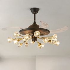 a ceiling fan with many lights on it