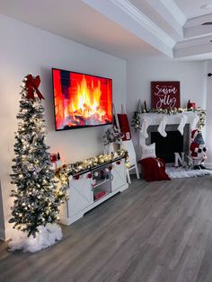 a living room decorated for christmas with decorations