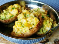 baked potatoes with broccoli and cheese in a bowl