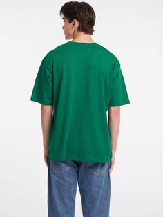 An oversized tee featuring our classic embroidered logo. Crafted in our organic cotton blend. Casual Green T-shirt With Embroidered Logo, Casual Green Tops With Embroidered Logo, Green Cotton Top With Embroidered Logo, Green Cotton Tops With Embroidered Logo, Casual T-shirt With Embroidered Logo, Relaxed Fit Green Top With Embroidered Logo, Green Relaxed Fit Top With Embroidered Logo, Relaxed Fit Cotton Top With Embroidered Logo, Oversized Green Classic Top