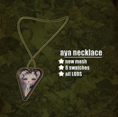 a necklace with an image of a cat in the shape of a heart on it