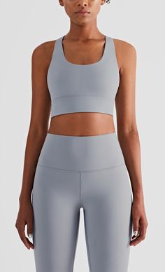 The EMES SHOP sports bra details a soft buttery touch that exemplifies comfort in sportswear. Featuring a cross back. this athletic wear will be your go-to for each workout session.MATERIAL: 75% Nylon. 25% Spandex MEASUREMENTS: Small | Bust: 34" in . Band: 28" in . Length: 32.5" in Medium | Bust: 36.5" in . Band: 30.5" in . Length: 33.5" in Large | Bust: 39" in . Band: 33" in . Length: 34.5" in MEASUREMENTS: Small | Bust: 86.4" cm . Band: 71.1" cm . Length: 82.5" cm Medium | Bust: 92.7" cm . Band: 77.5" cm . Length: 85.09" cm Large | Bust: 99.1" cm . Band: 83.8" cm . Length: 87.6" cm