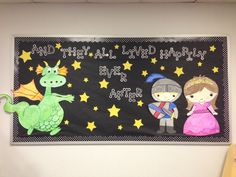 a bulletin board with children's drawings on it