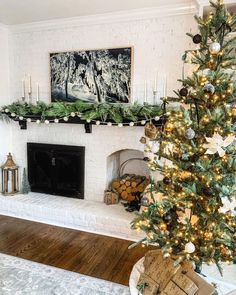 a decorated christmas tree in front of a fireplace