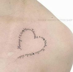 the back of a woman's shoulder with writing on it