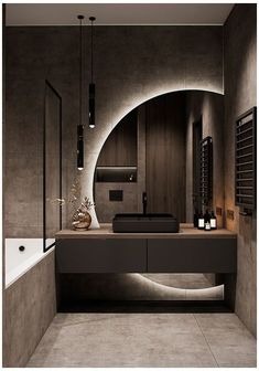 a bathroom with a tub, sink and large mirror in the middle of it's wall